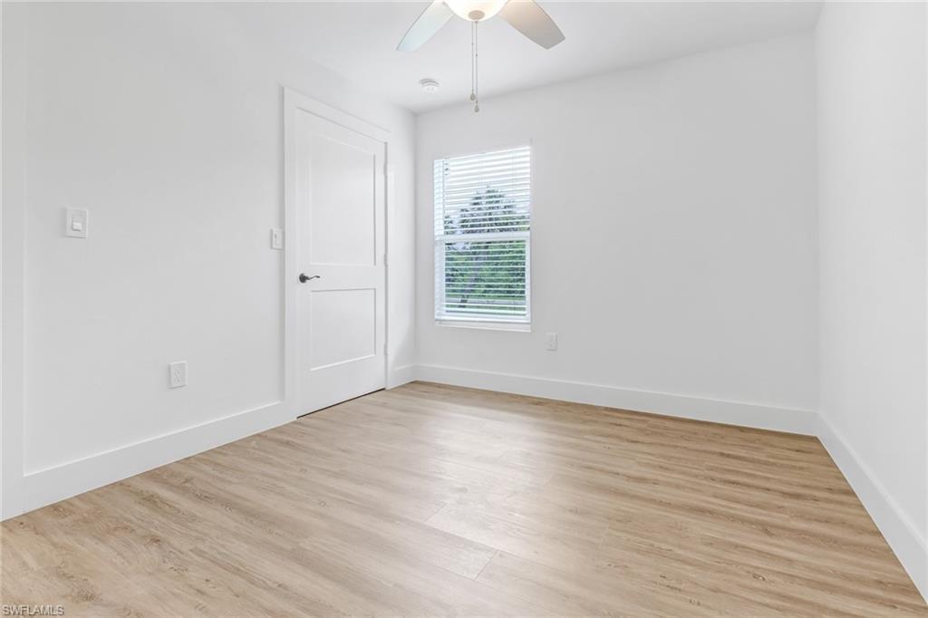 981 11th Street Southwest Naples, FL 34117 - Photo 13 of 24 Spare room with ceiling fan and light hardwood / wood-style flooring