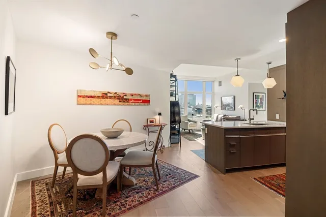 a view of a dining room with furniture