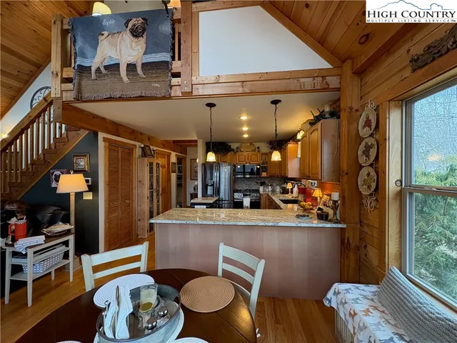 a room with furniture and a chandelier