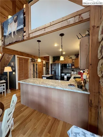 a view of a living room with furniture