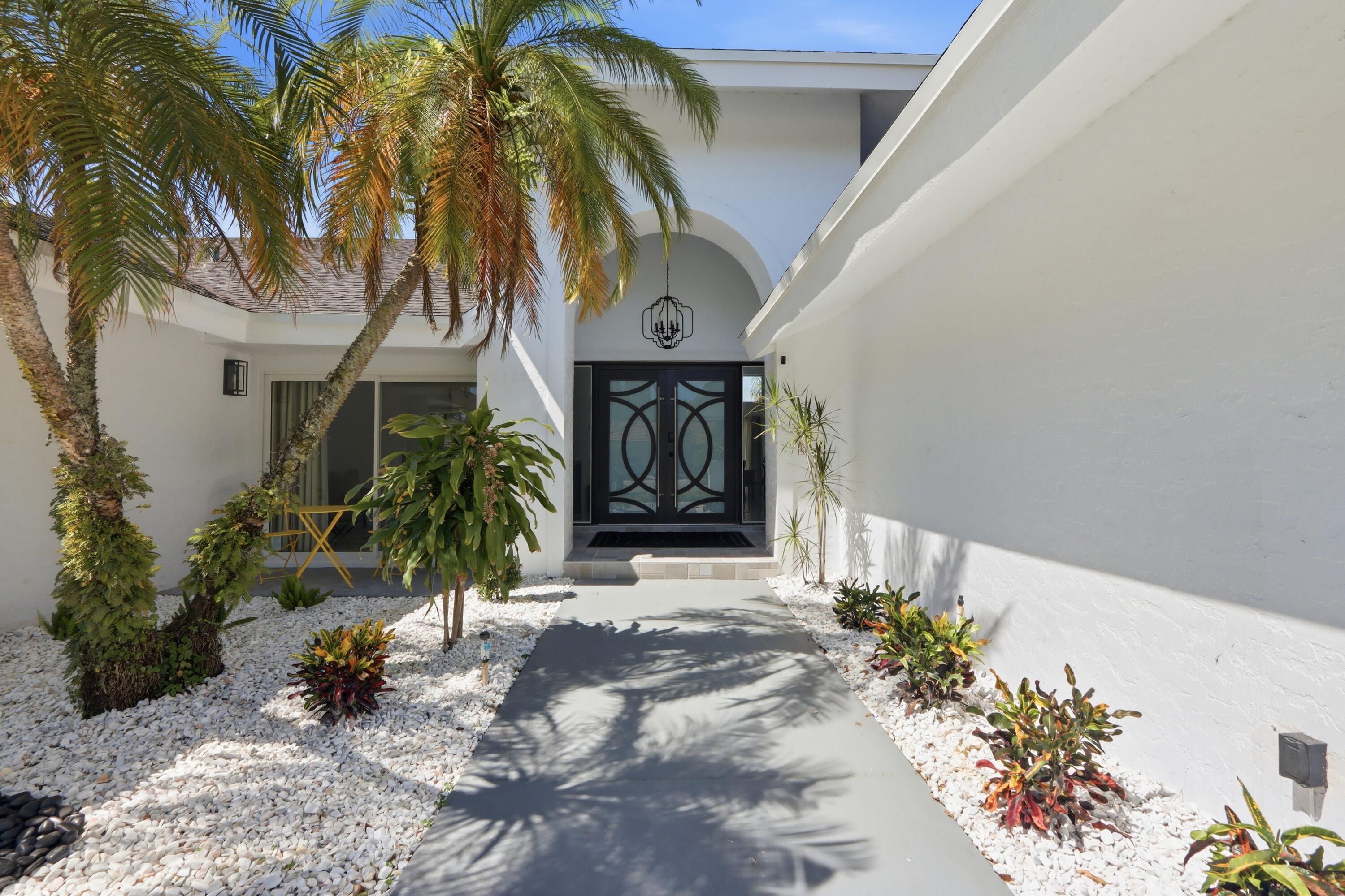 12725 Kingsway Road Wellington, FL 33414 - Photo 2 of 33 008-005-Front Entry Detail-4200x2800