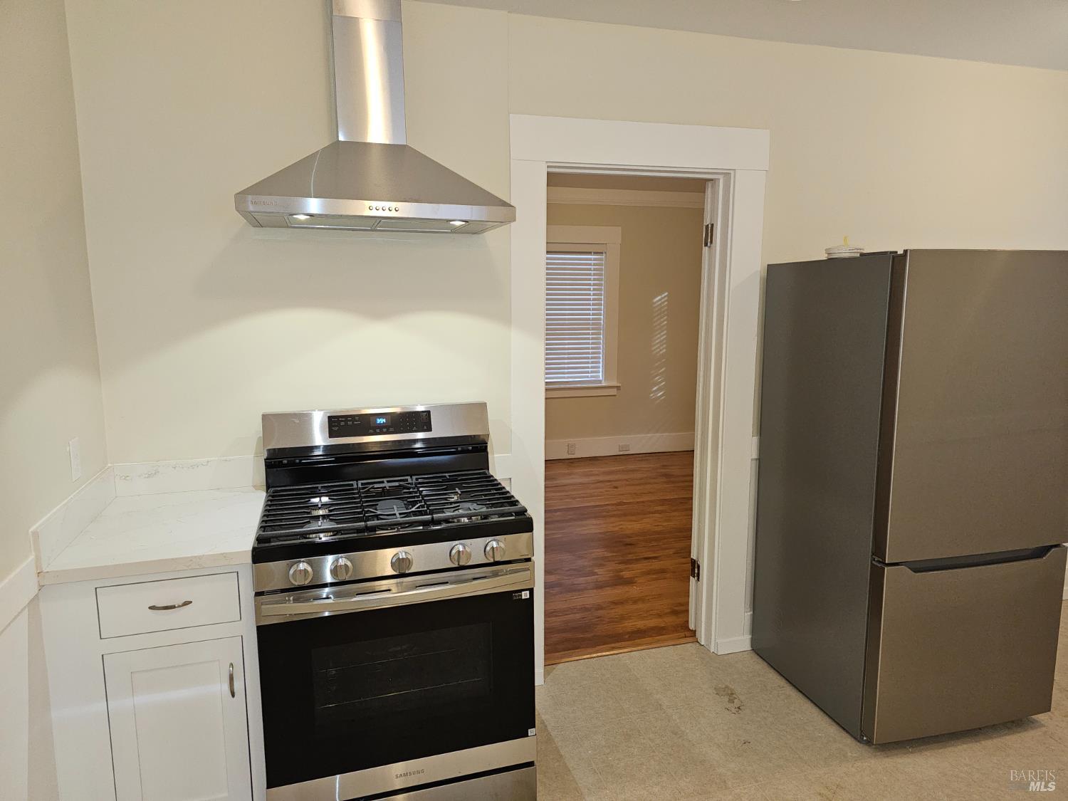 412 Lincoln Street Santa Rosa, CA 95401 - Photo 17 of 35 a kitchen with stainless steel appliances granite countertop a refrigerator and a stove