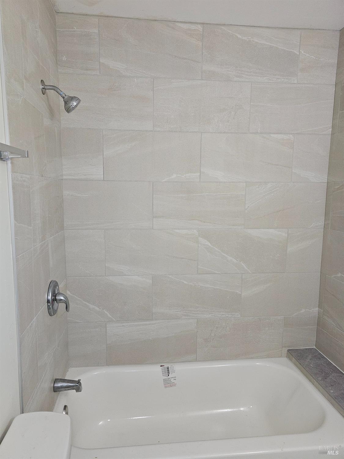 412 Lincoln Street Santa Rosa, CA 95401 - Photo 21 of 35 a bathroom with a shower and a toilet
