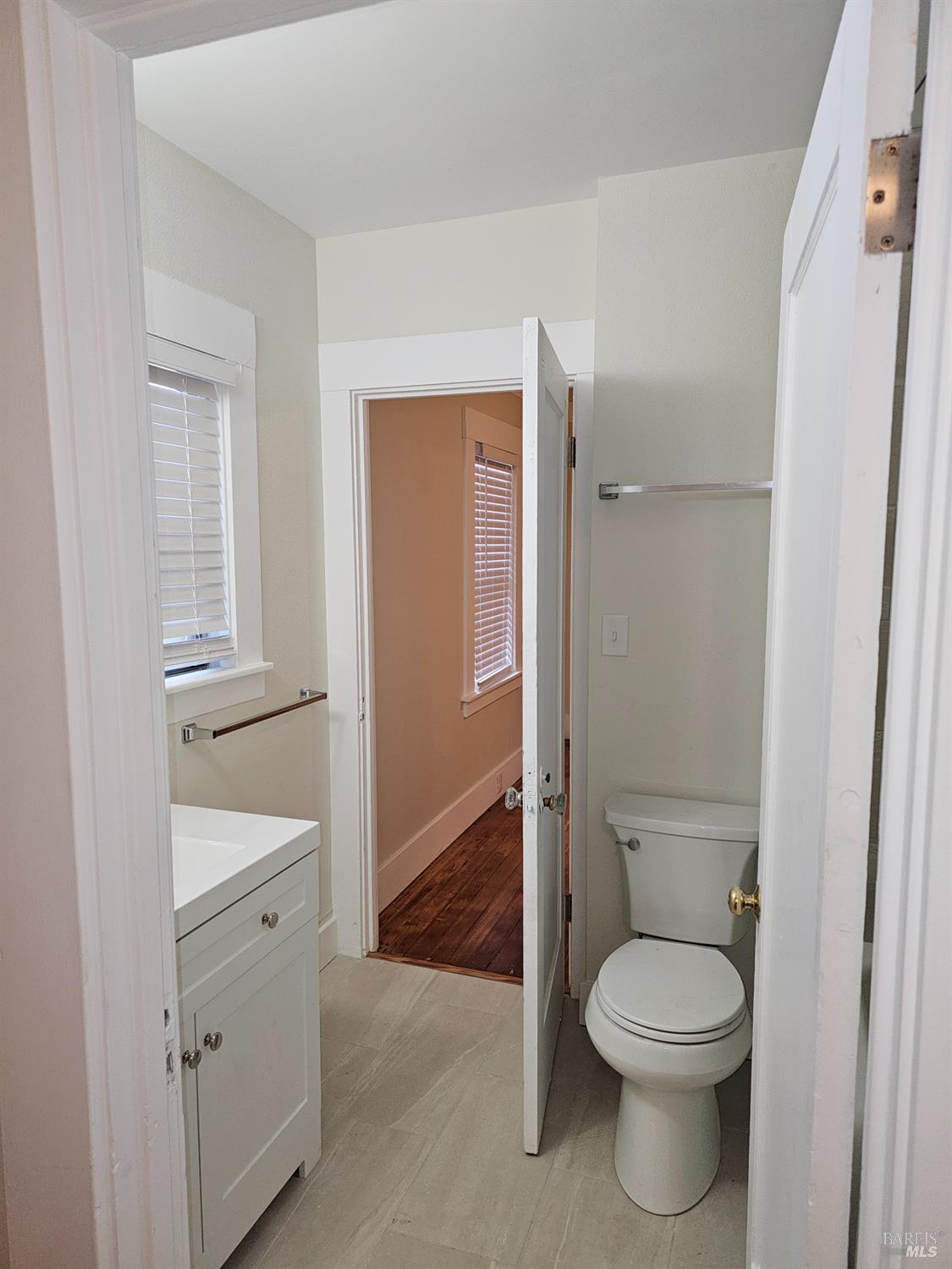 412 Lincoln Street Santa Rosa, CA 95401 - Photo 22 of 35 a bathroom with a toilet a sink and shower