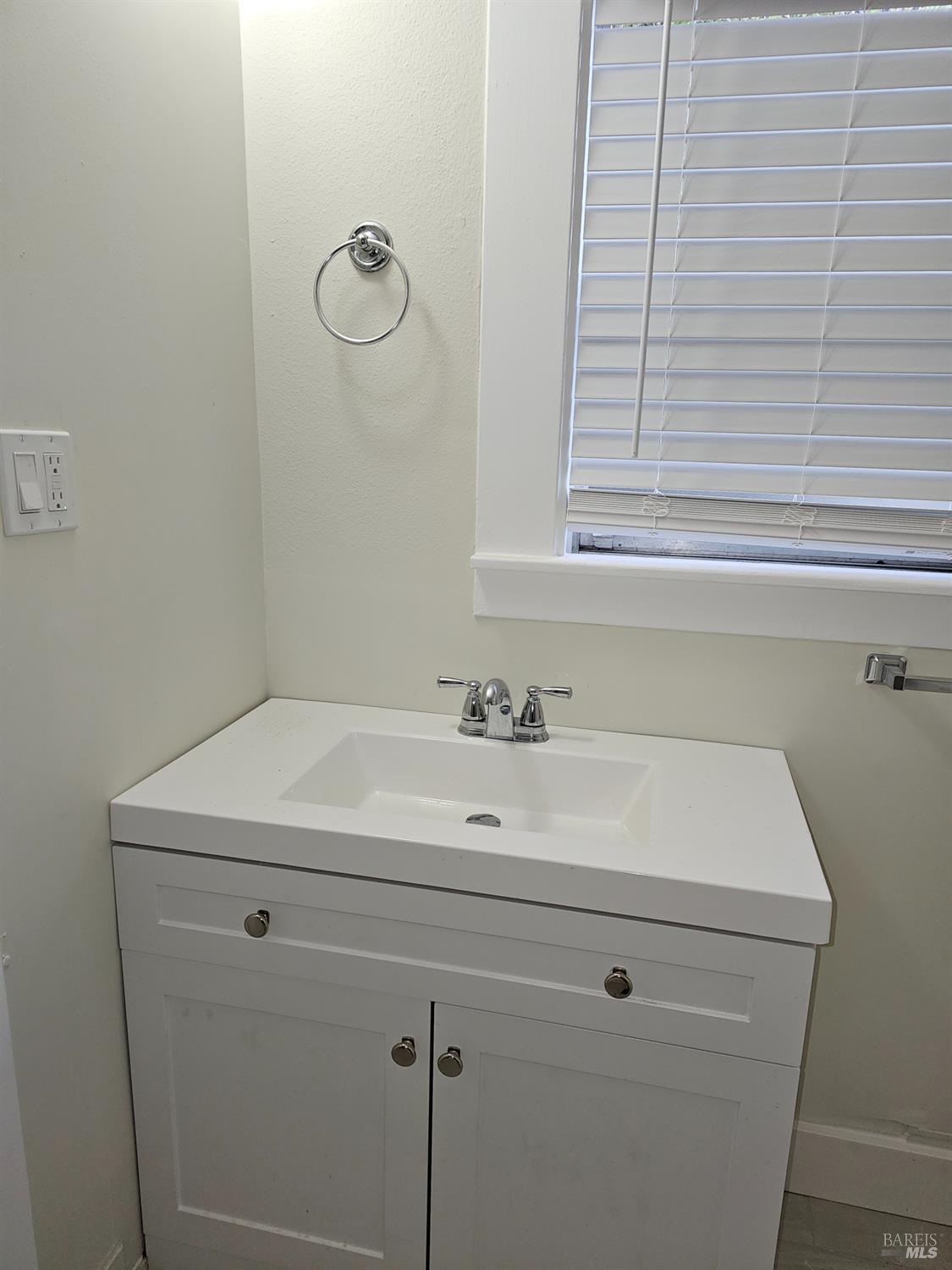 412 Lincoln Street Santa Rosa, CA 95401 - Photo 23 of 35 a bathroom with a sink and a vanity