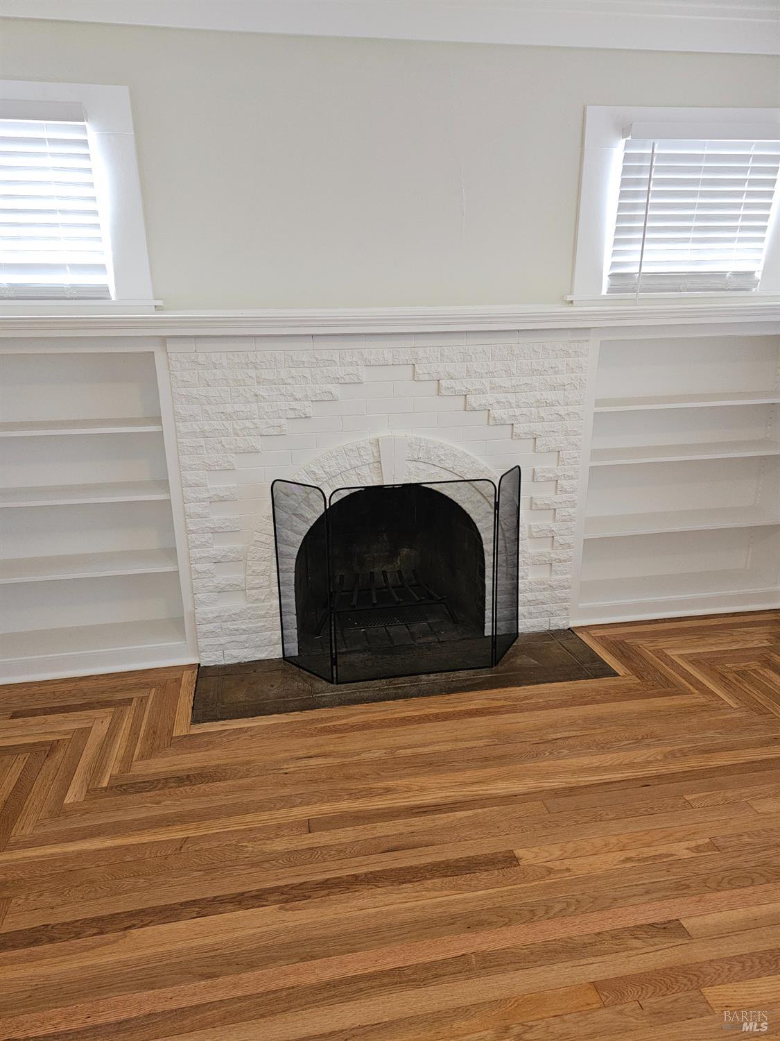 412 Lincoln Street Santa Rosa, CA 95401 - Photo 31 of 35 a living room with a fireplace and a floor to ceiling window