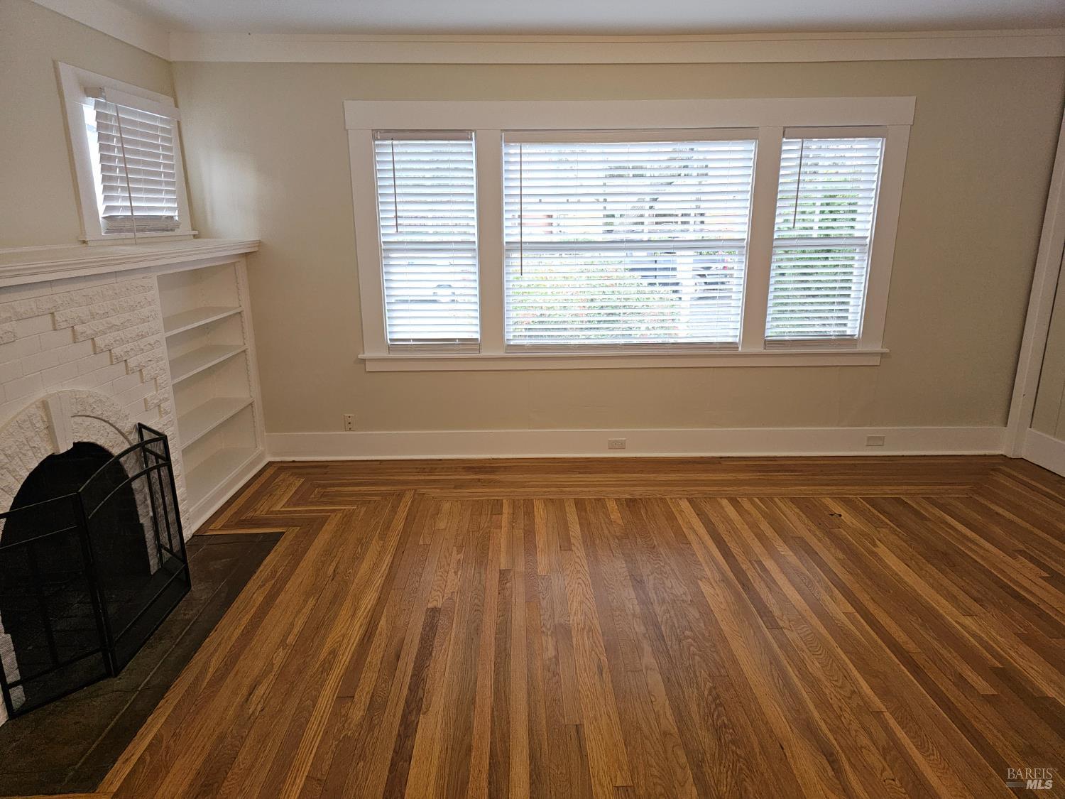 412 Lincoln Street Santa Rosa, CA 95401 - Photo 5 of 35 a view of a livingroom with wooden floor and a fireplace