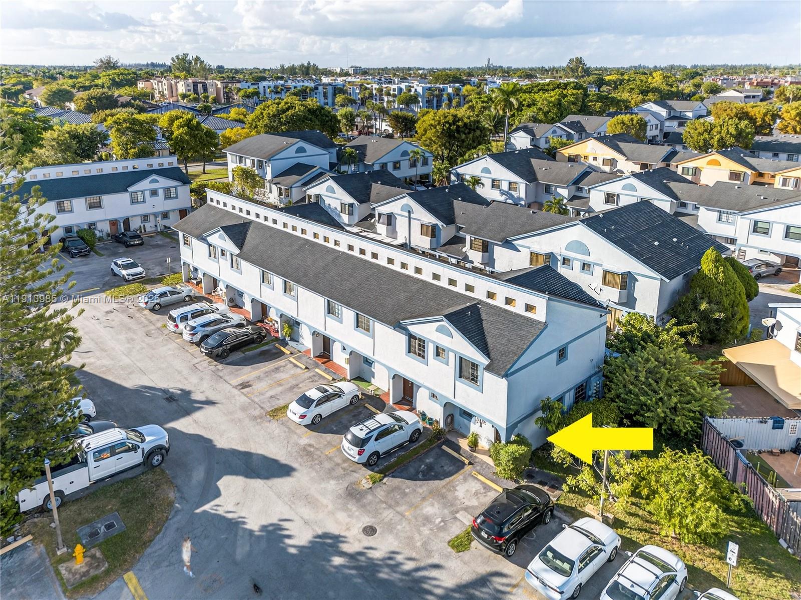 12045 Southwest 18th Street, Unit 142 Miami, FL 33175 - Photo 1 of 18 an aerial view of a house with a swimming pool yard and outdoor seating
