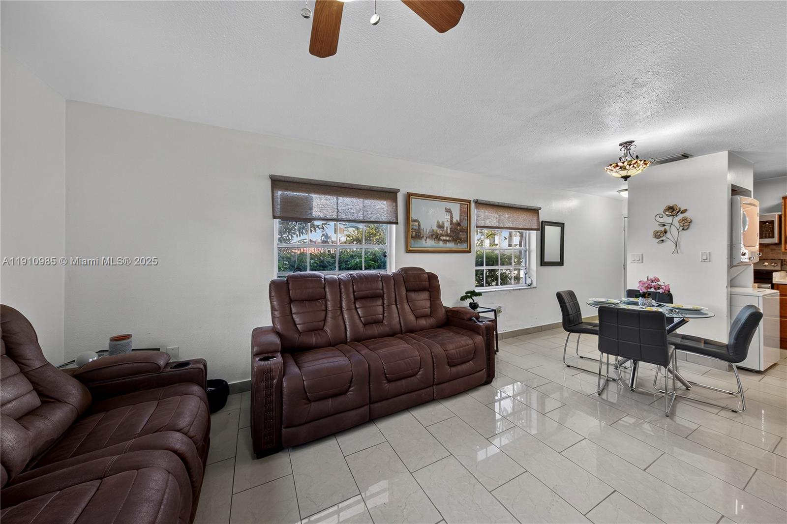 12045 Southwest 18th Street, Unit 142 Miami, FL 33175 - Photo 6 of 18 a living room with furniture
