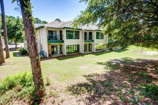 a view of a yard in front of house