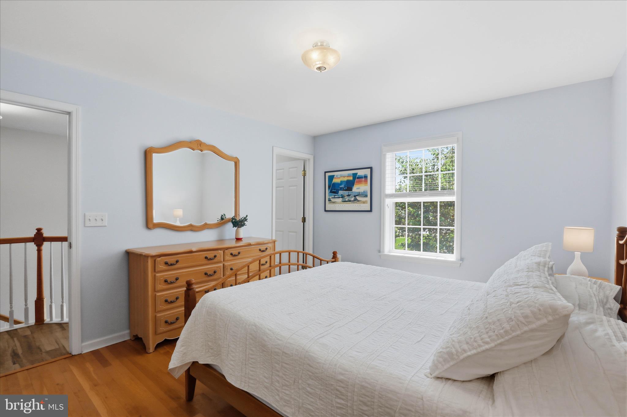533 Thornberry Lane Lititz, PA 17543 - Photo 26 of 56 a bedroom with a large bed and a dresser with mirror