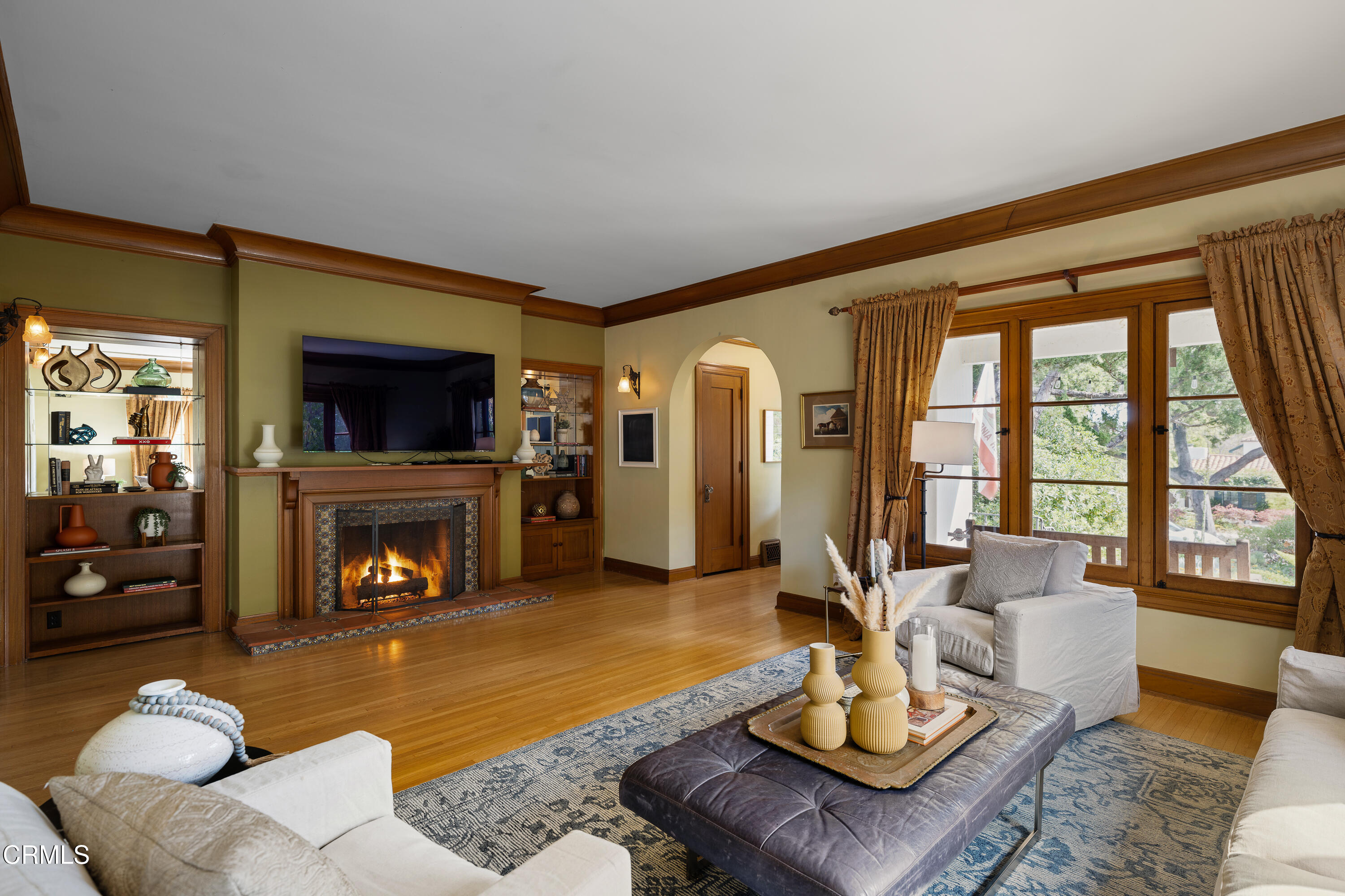 1073 Atchison Street Pasadena, CA 91104 - Photo 11 of 66 a living room with furniture and a fireplace