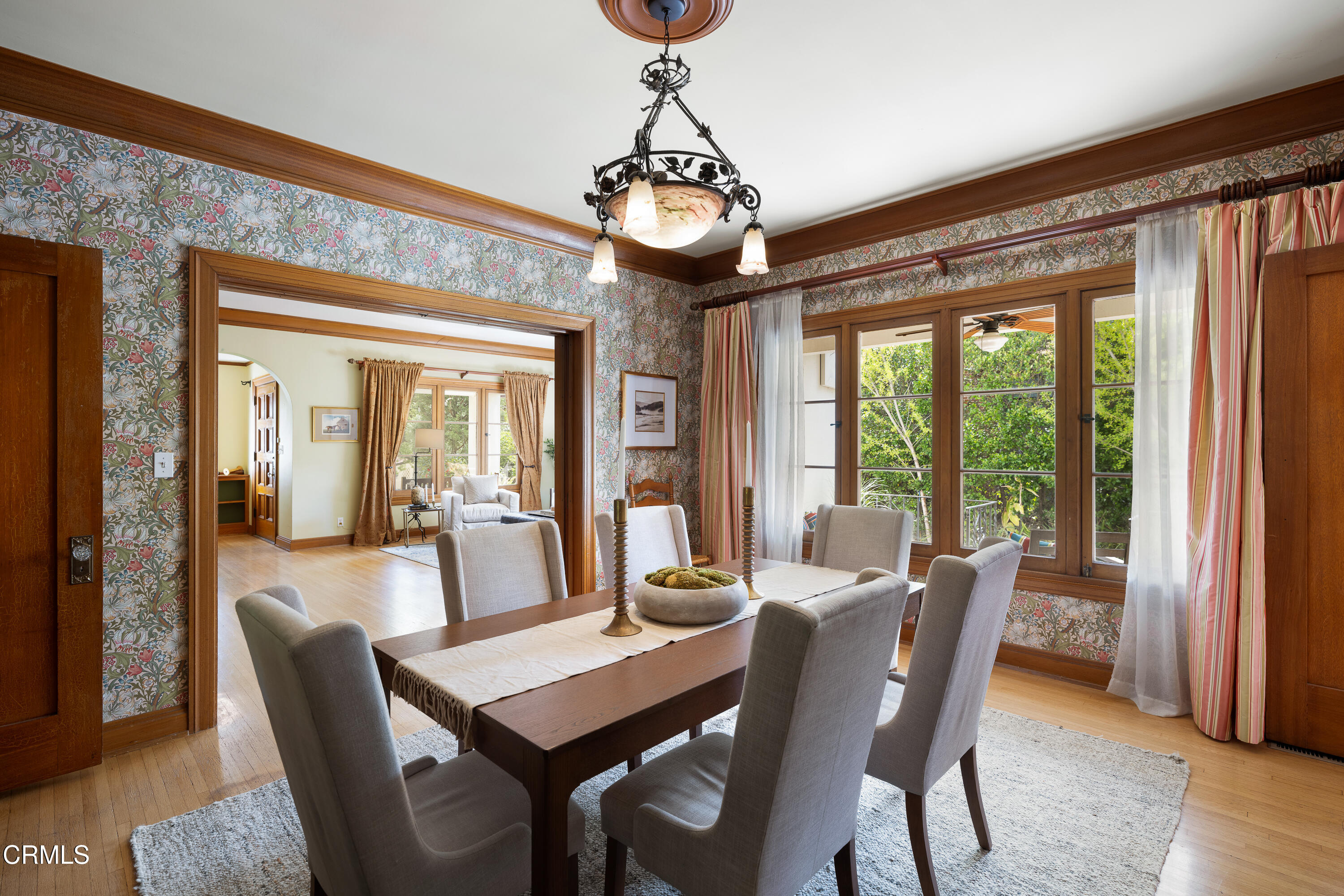 1073 Atchison Street Pasadena, CA 91104 - Photo 15 of 66 a view of a dining room with furniture wooden floor and chandelier