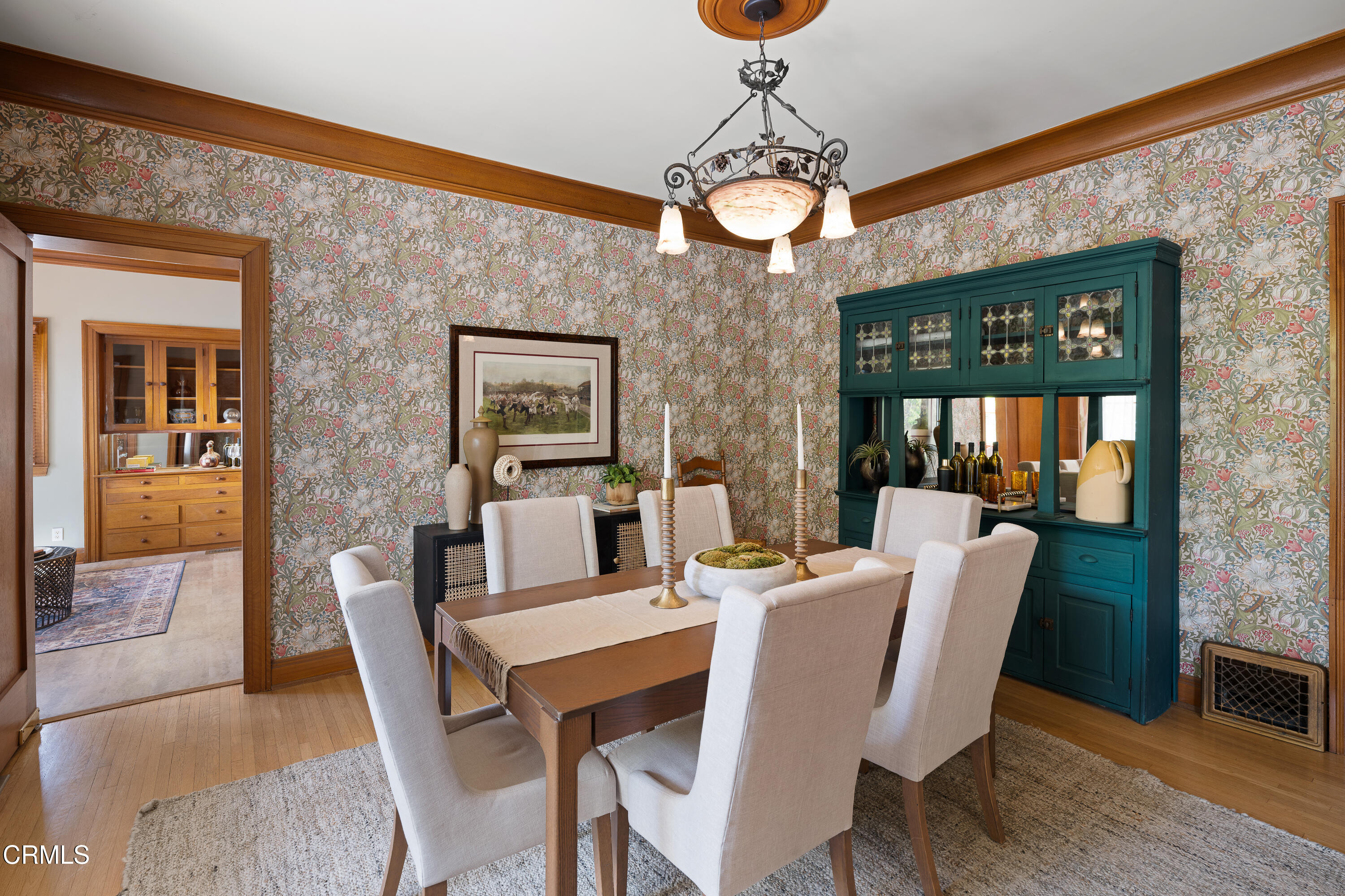 1073 Atchison Street Pasadena, CA 91104 - Photo 17 of 66 a view of a dining room with furniture wooden floor and chandelier
