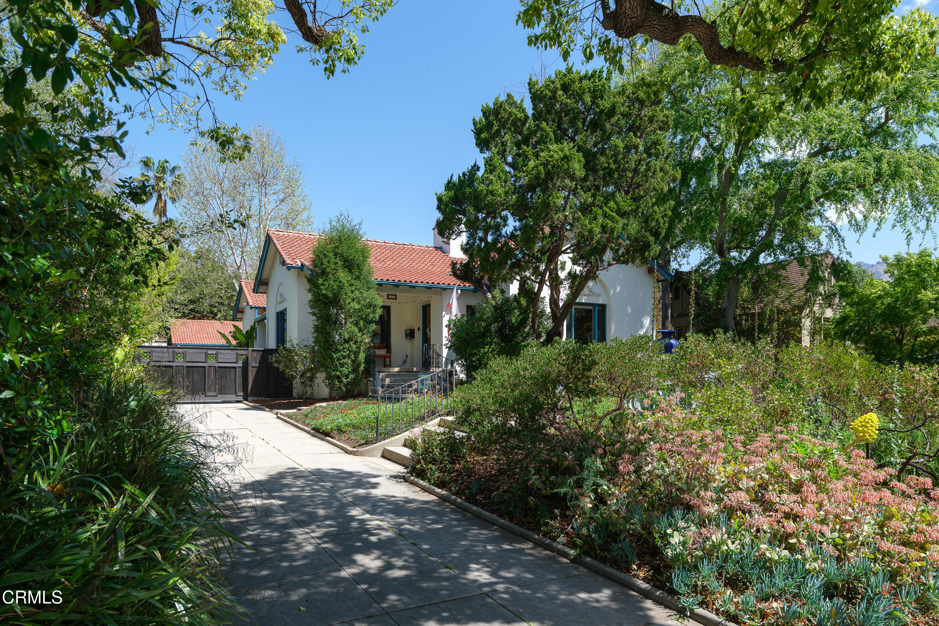 1073 Atchison Street Pasadena, CA 91104 - Photo 2 of 66 a front view of a house with a yard and tree s