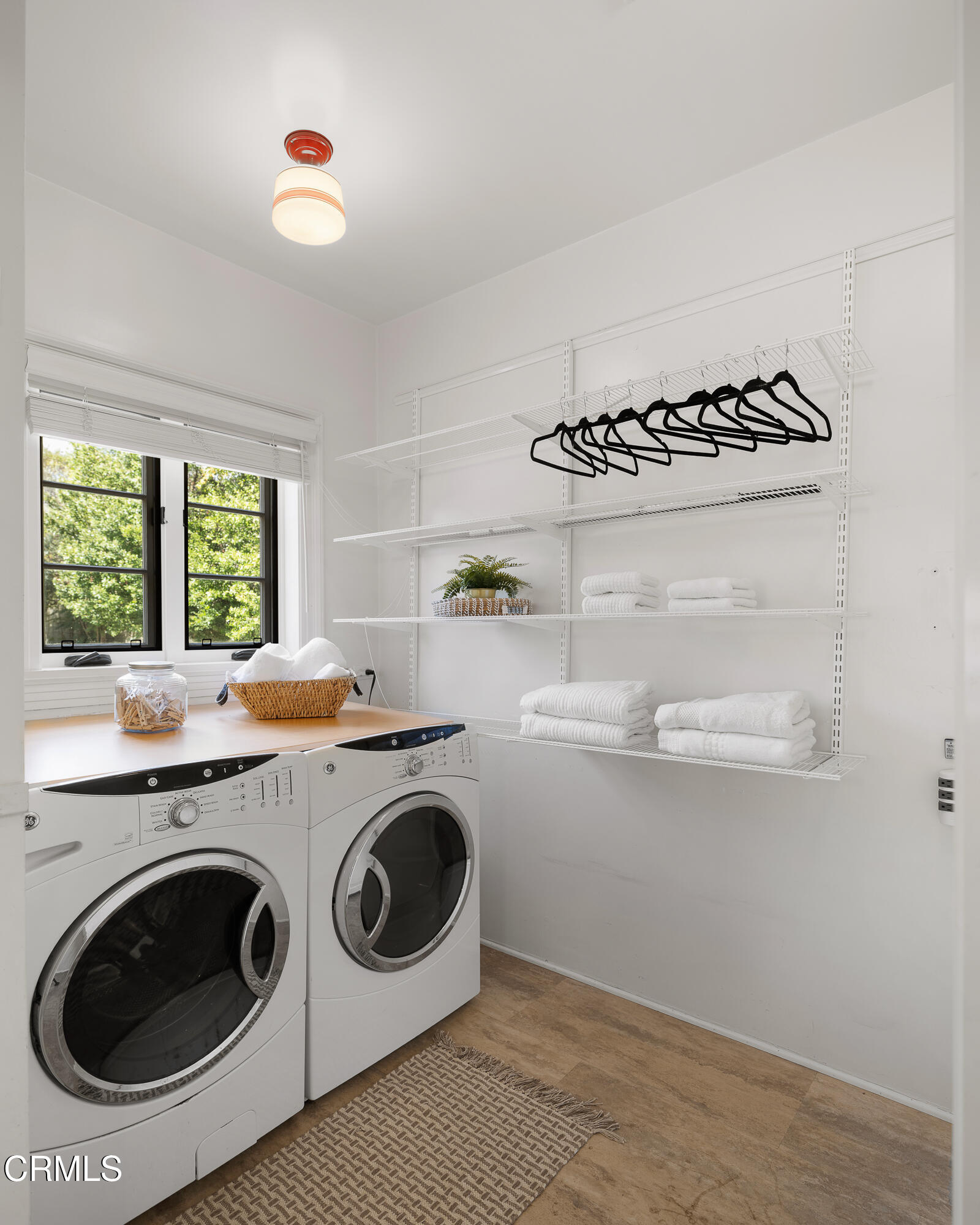 1073 Atchison Street Pasadena, CA 91104 - Photo 25 of 66 a utility room with sink dryer and washer