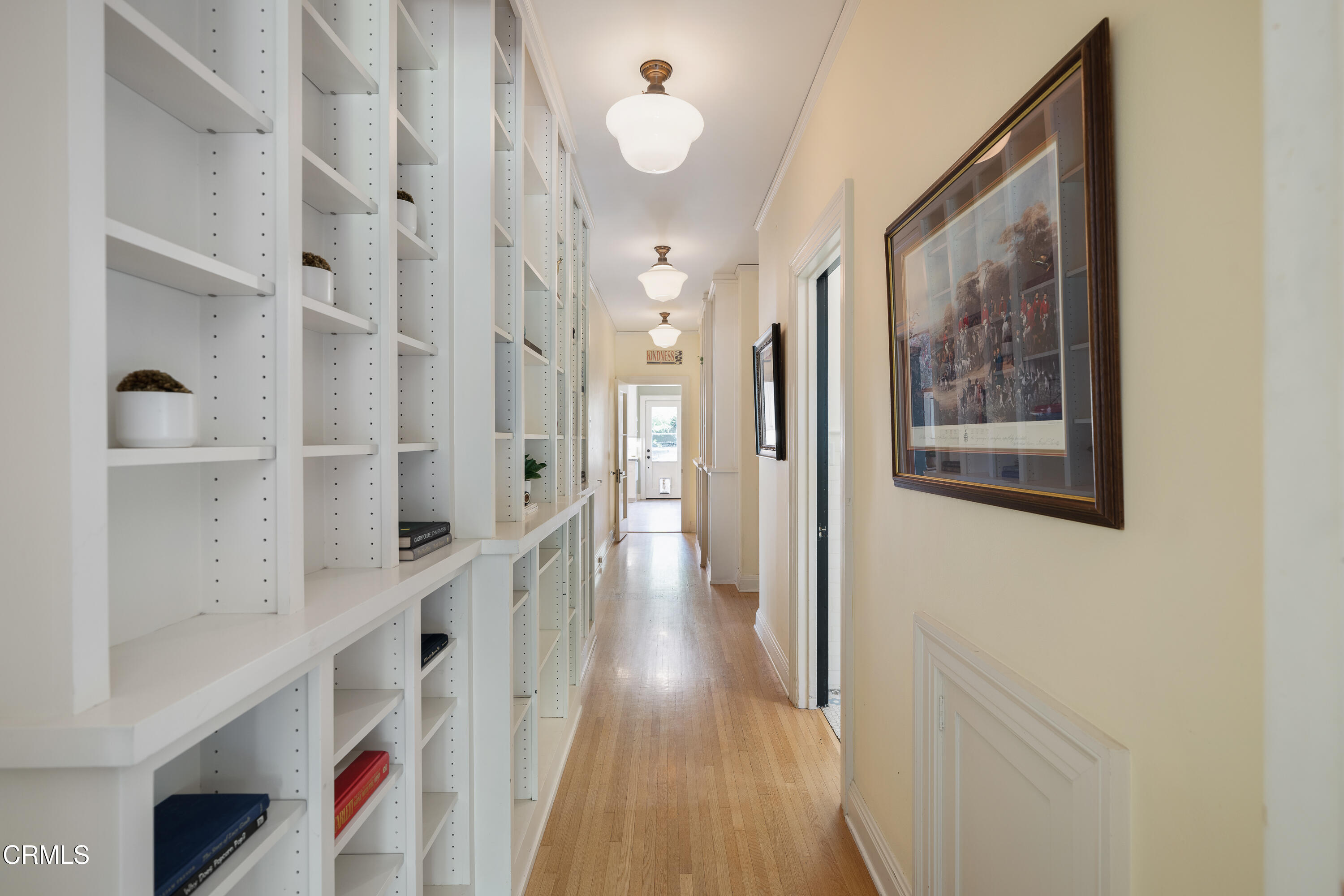 1073 Atchison Street Pasadena, CA 91104 - Photo 26 of 66 a view of a hallway with wooden floor and staircase