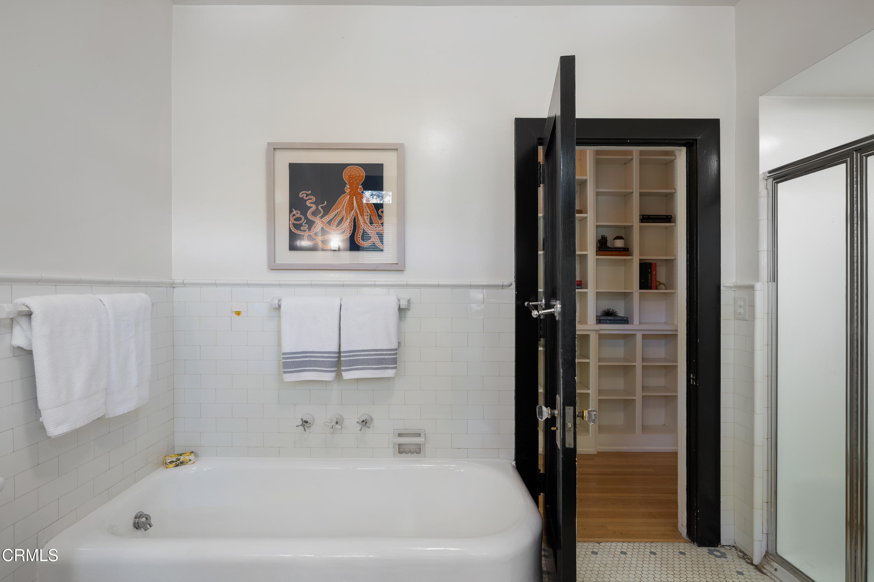 1073 Atchison Street Pasadena, CA 91104 - Photo 31 of 66 a white bath tub sitting next to a shower