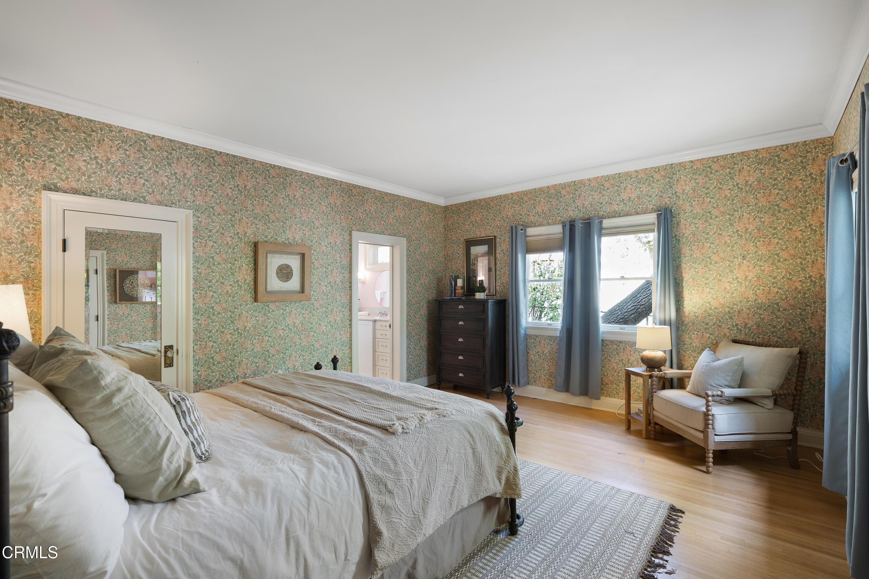 1073 Atchison Street Pasadena, CA 91104 - Photo 32 of 66 a bedroom with a bed and wooden floor