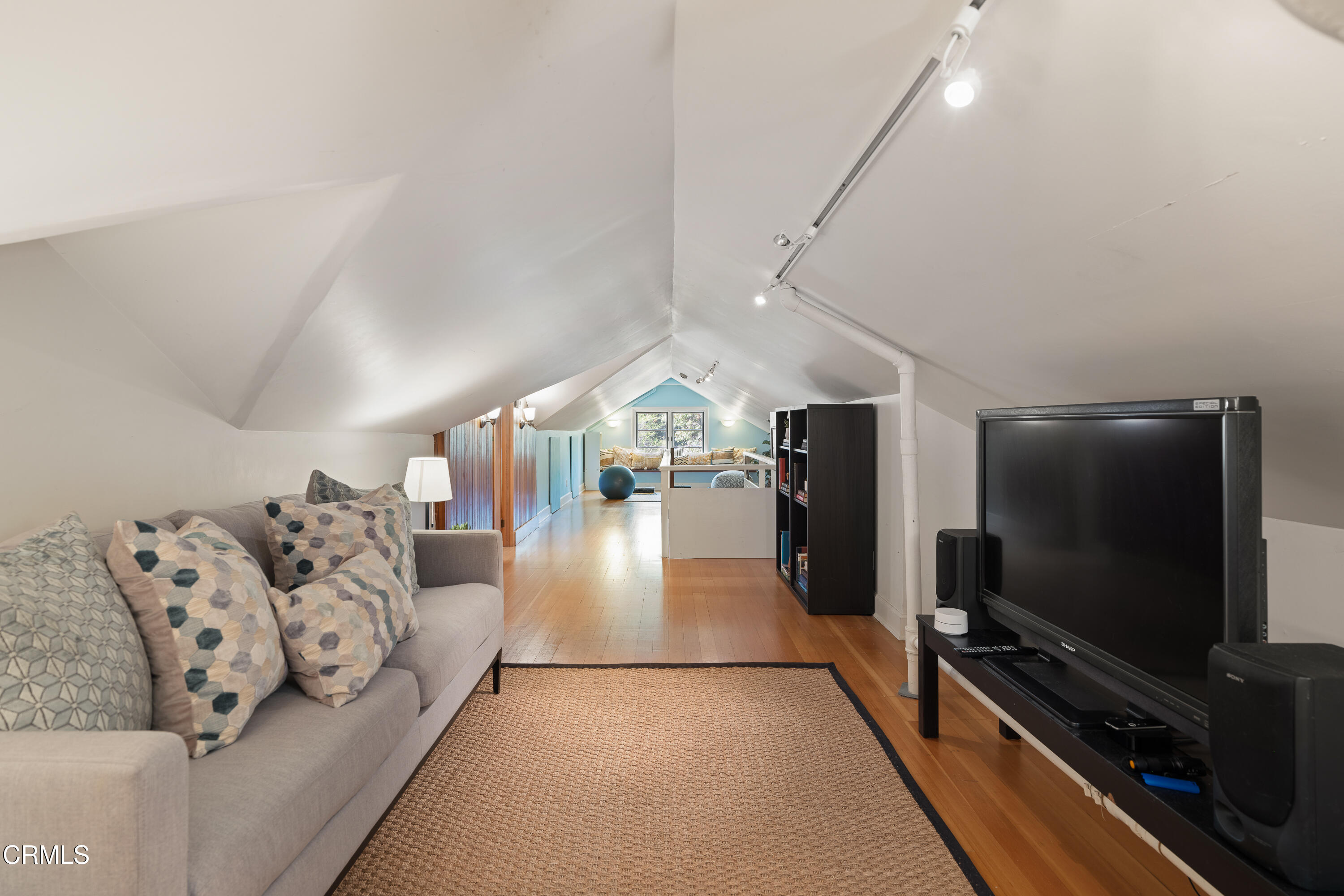 1073 Atchison Street Pasadena, CA 91104 - Photo 40 of 66 a living room with furniture and a flat screen tv