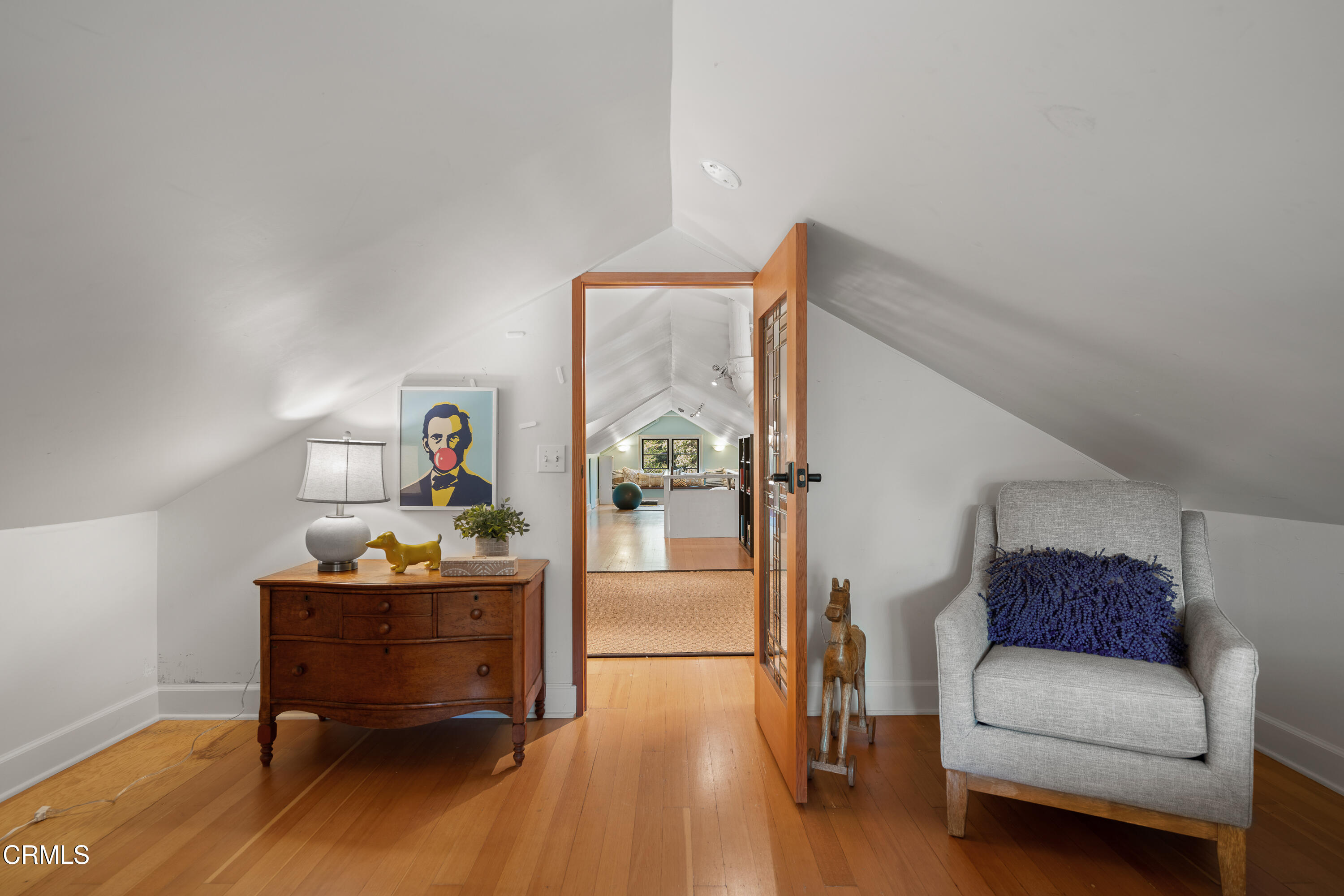 1073 Atchison Street Pasadena, CA 91104 - Photo 43 of 66 a workspace with furniture and wooden floor