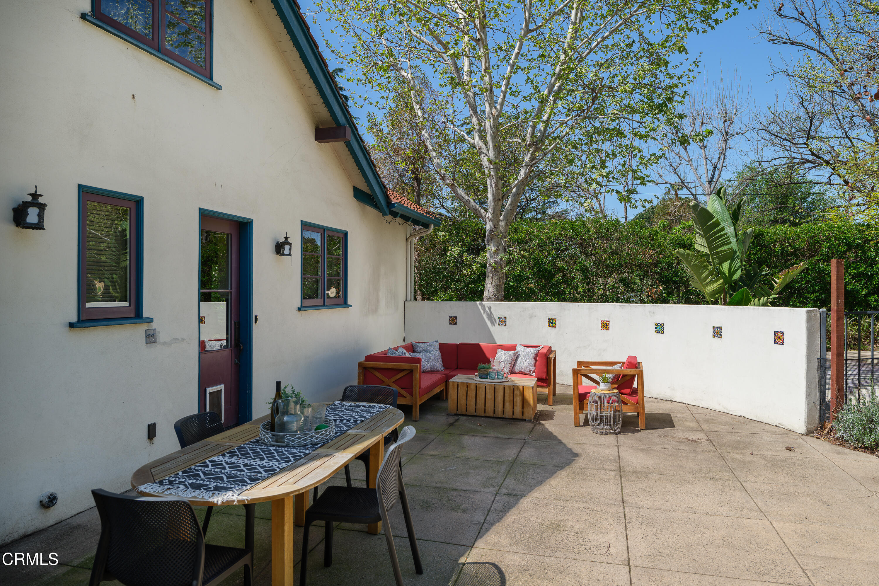 1073 Atchison Street Pasadena, CA 91104 - Photo 48 of 66 a backyard of a house with table and chairs