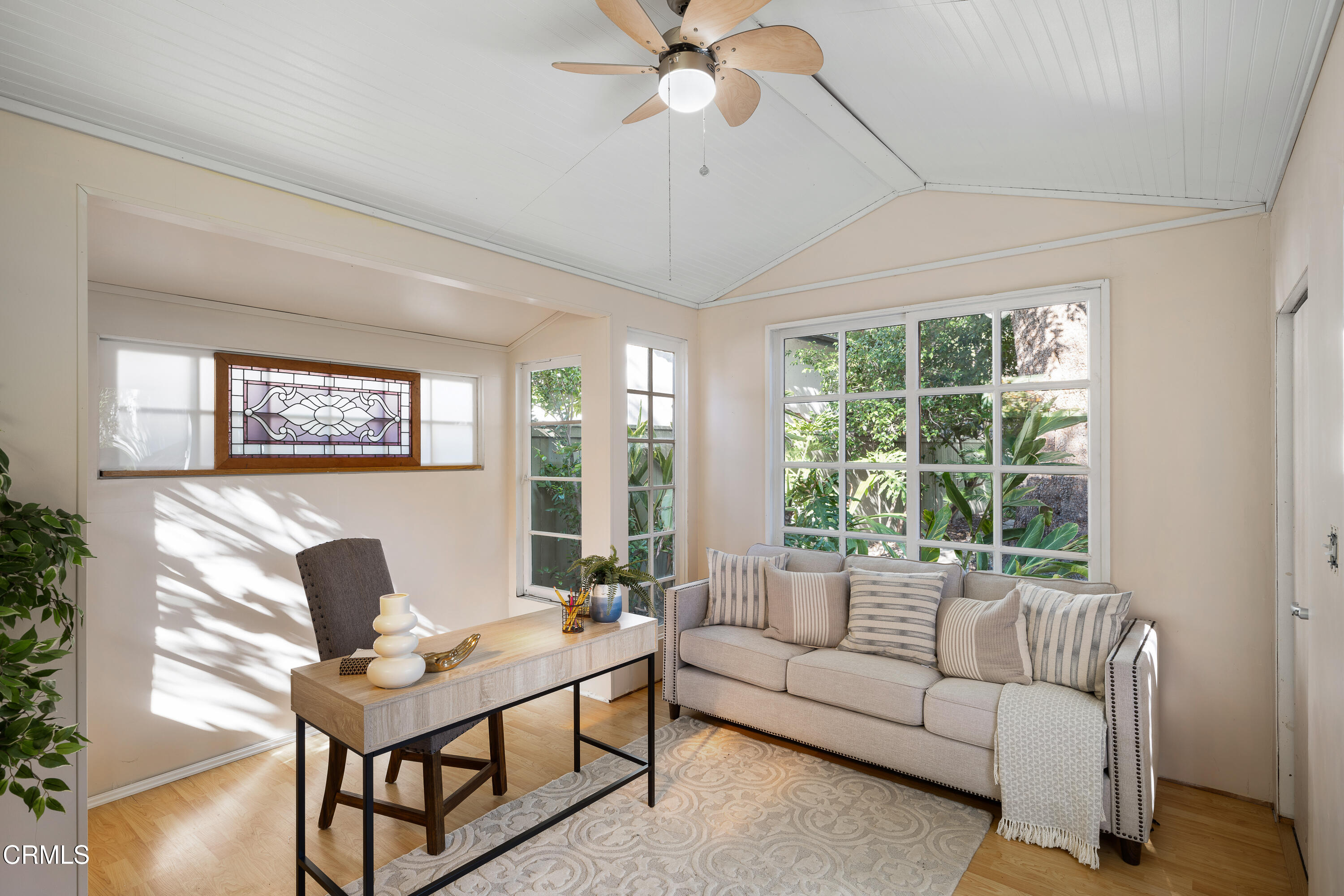 1073 Atchison Street Pasadena, CA 91104 - Photo 55 of 66 a living room with furniture and a large window