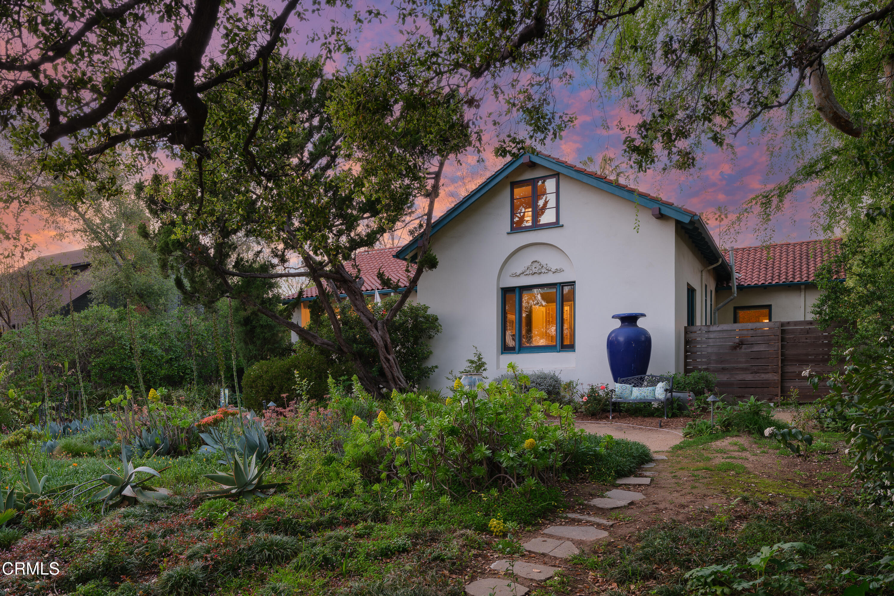 1073 Atchison Street Pasadena, CA 91104 - Photo 66 of 66 a view of a house with a small yard and a large tree
