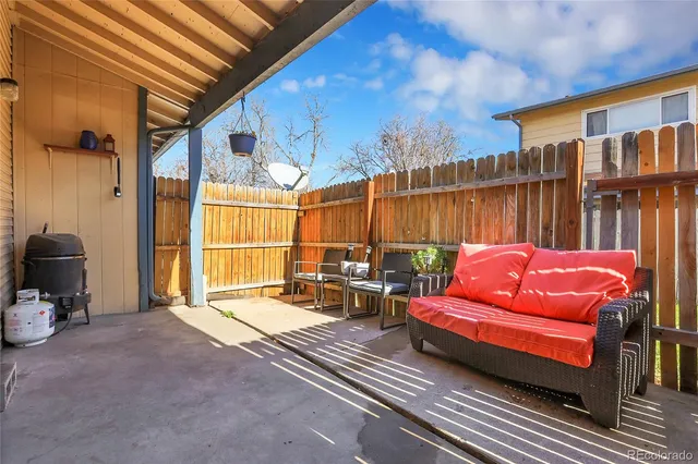 a backyard of a house with seating space