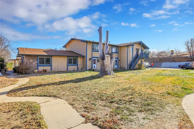a house view with a swimming pool