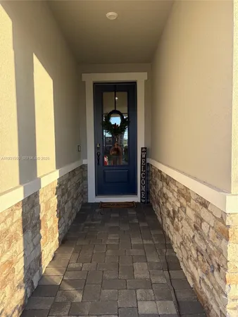 a view of hallway with windows
