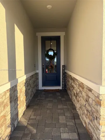 a view of hallway with windows
