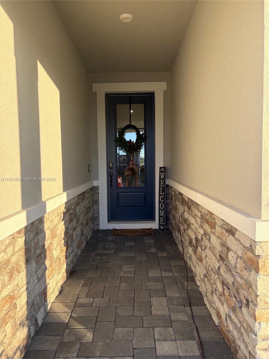 5020 124th Avenue East Parrish, FL 34219 - Photo 3 of 25 a view of hallway with windows