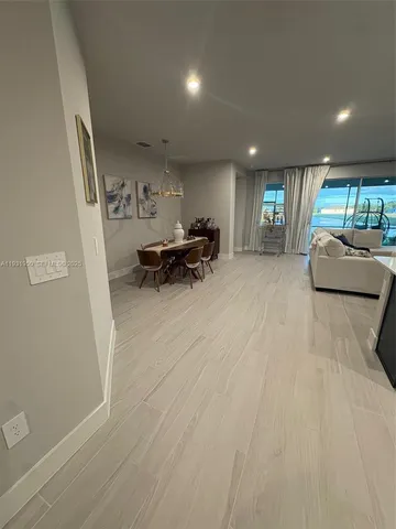 a large white kitchen with lots of counter space