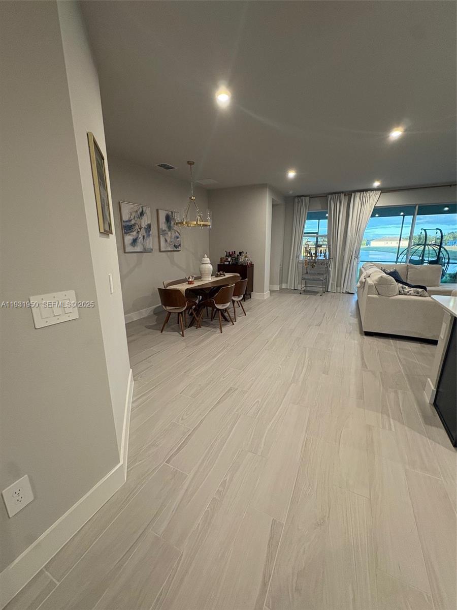5020 124th Avenue East Parrish, FL 34219 - Photo 9 of 25 a view of kitchen with furniture and a window
