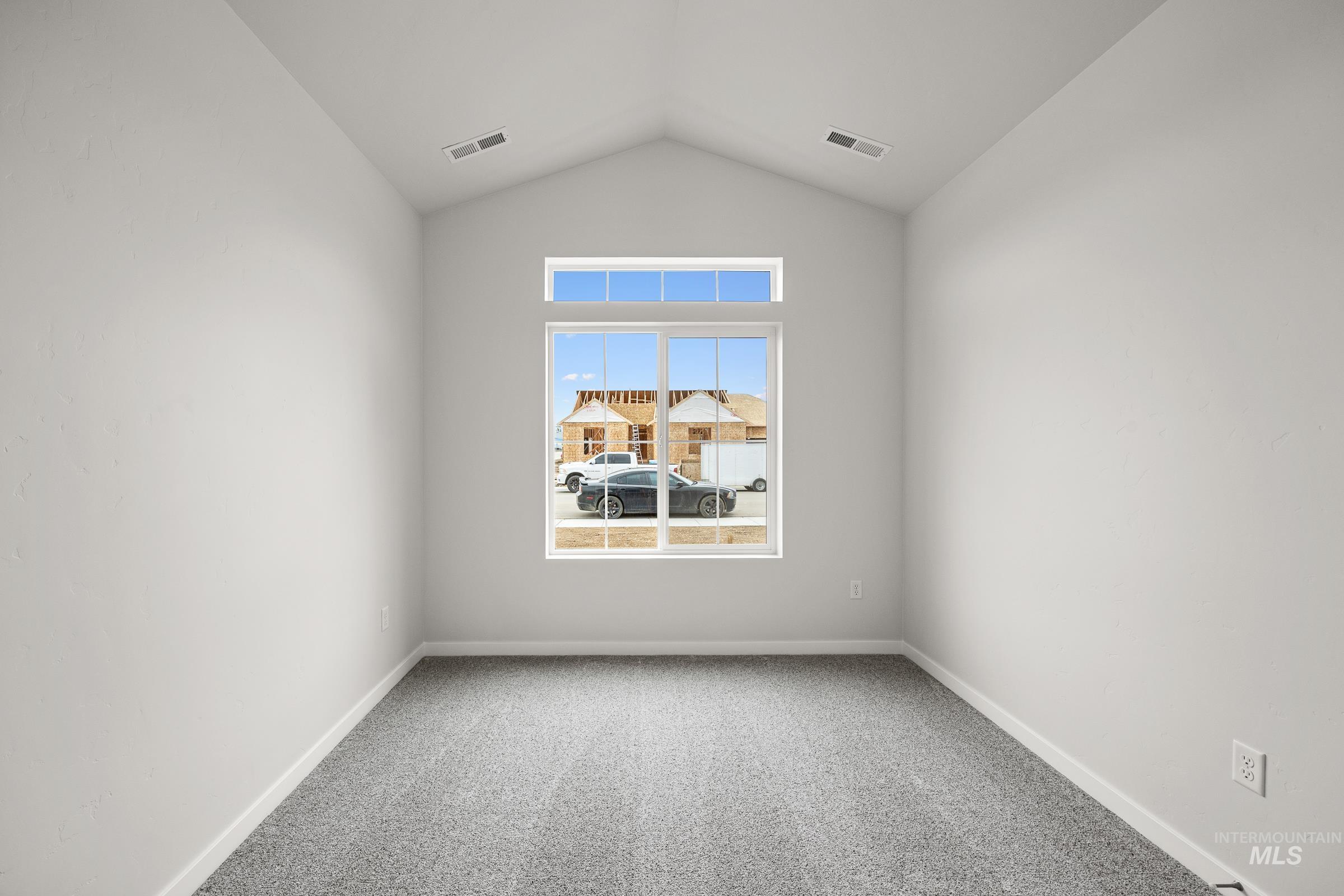 13654 Inman Court Caldwell, ID 83607 - Photo 24 of 25 Empty room featuring carpet floors and baseboards