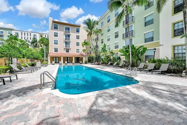 a view of a swimming pool with a patio