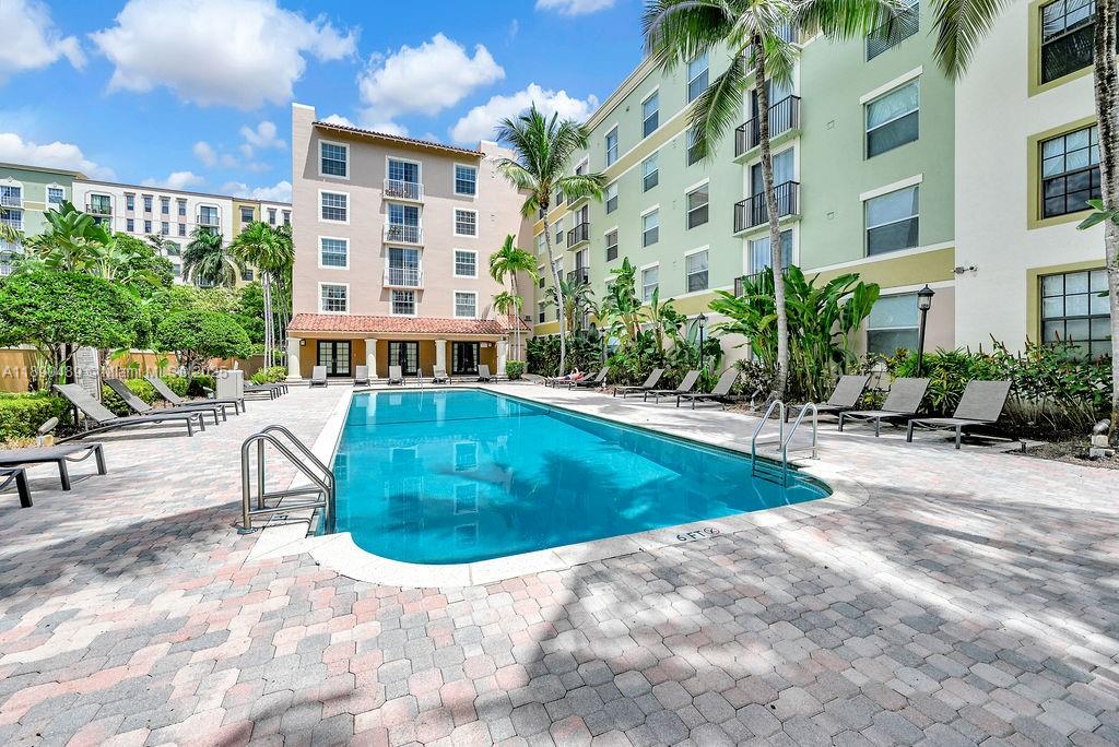1919 Van Buren Street, Unit 416A Hollywood, FL 33020 - Photo 14 of 17 a view of a swimming pool with a patio