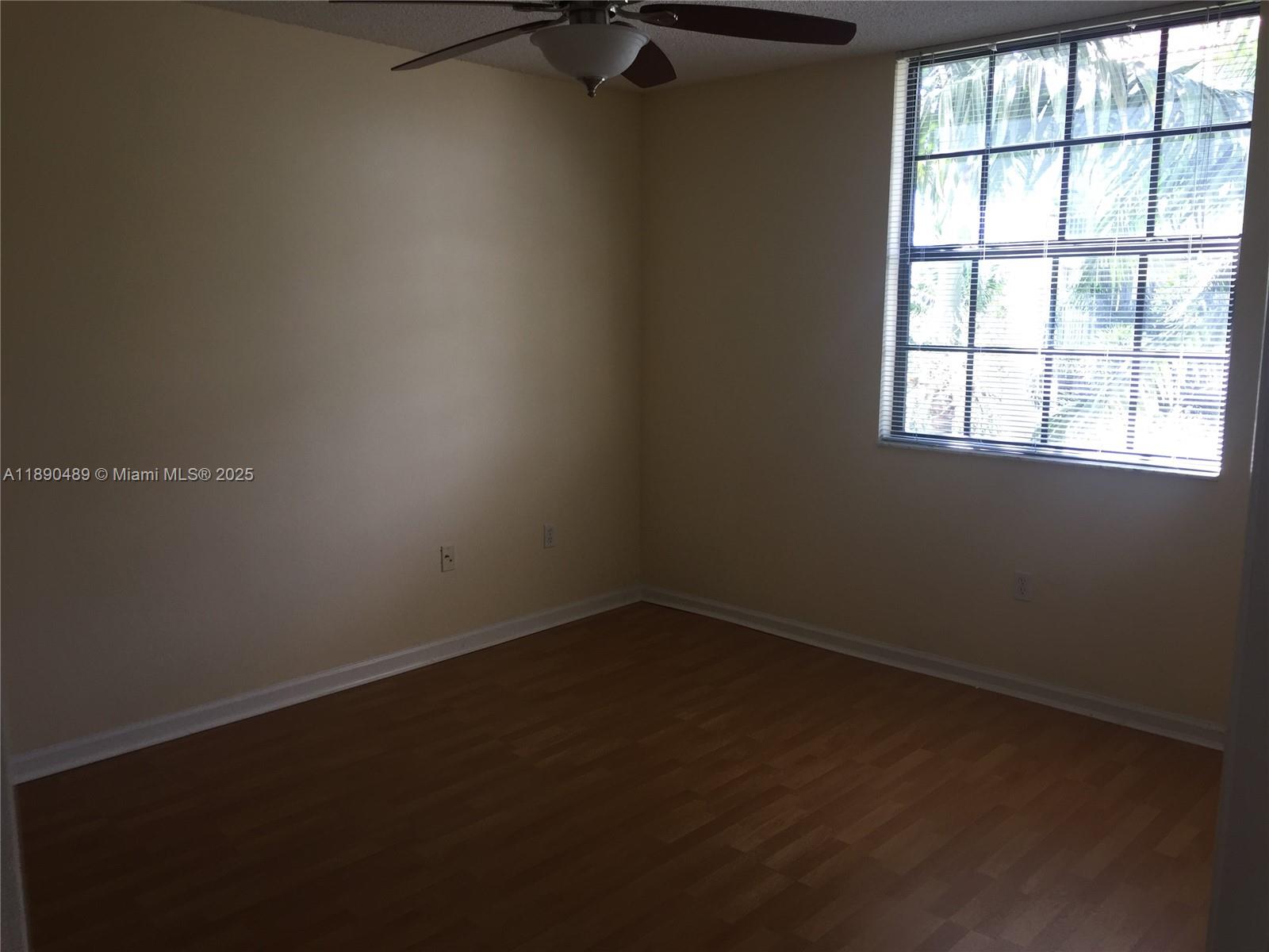 1919 Van Buren Street, Unit 416A Hollywood, FL 33020 - Photo 7 of 17 an empty room with a window