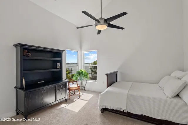 a spacious bathroom with a large tub shower and sink