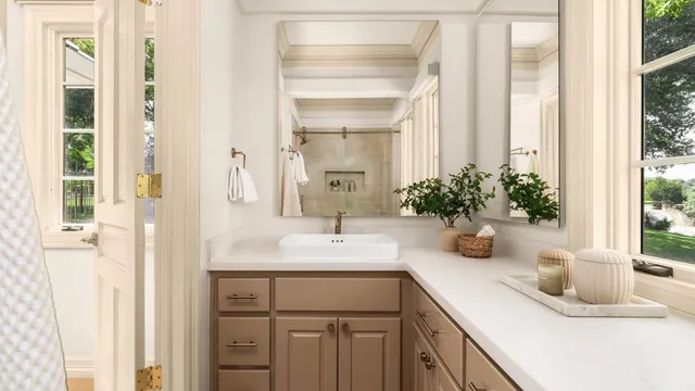 a bathroom with a sink a vanity and a mirror