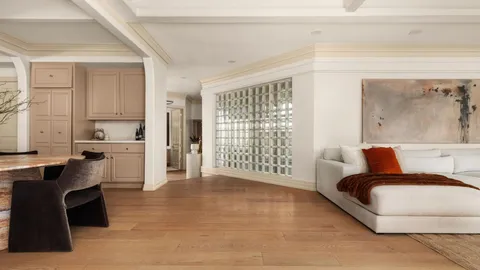 a spacious bedroom with a bed and a desk