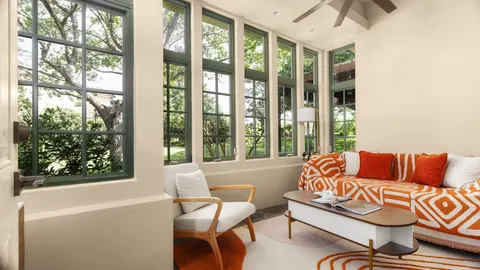 a outdoor living space with furniture and a potted plant