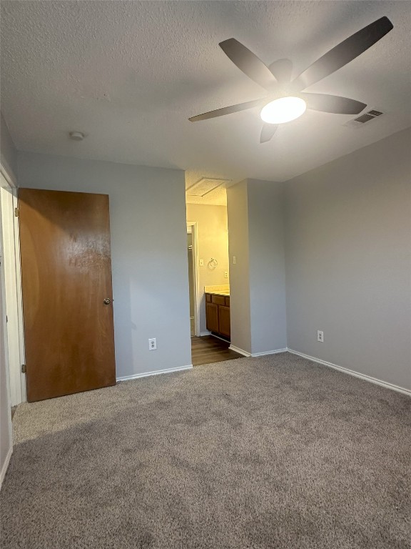 7800 Chimayo Cove, Unit B Austin, TX 78729 - Photo 16 of 17 a view of an empty room with a window