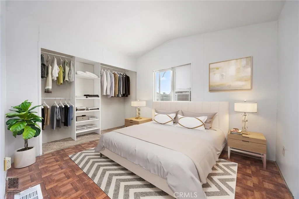 14035 Rosedale Highway, Unit 7 Bakersfield, CA 93301 - Photo 6 of 31 a bedroom with a bed and a couch