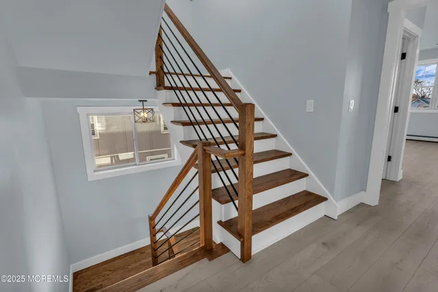 a bathroom with a shower and a sink