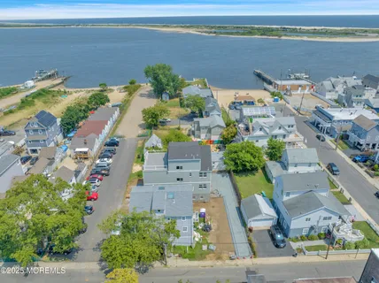 front view of a brick house with a street
