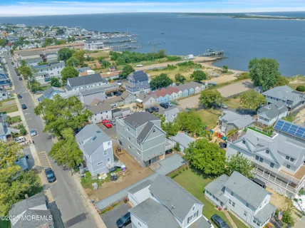 a large kitchen with cabinets and stainless steel appliances