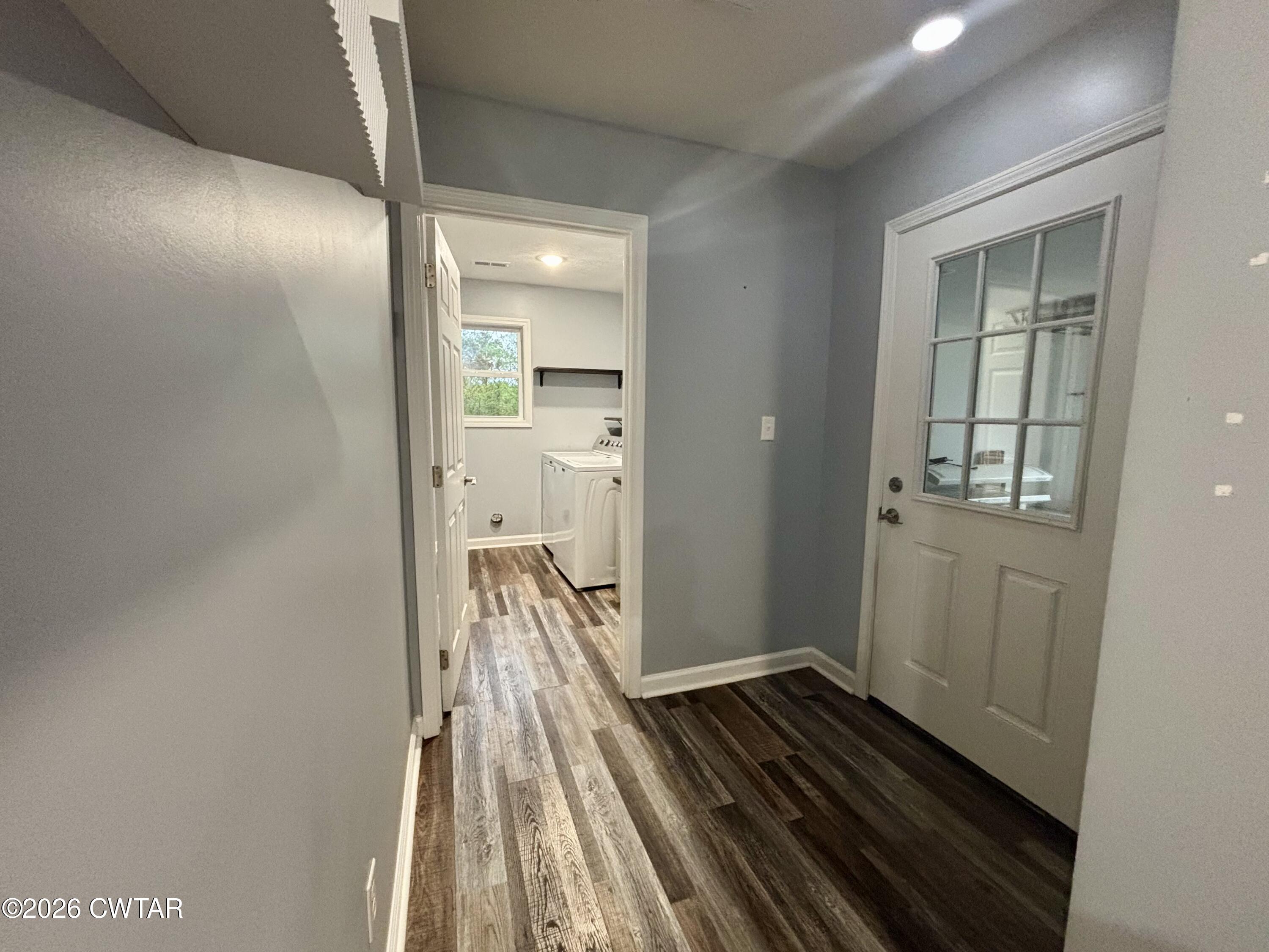 129 Gunner Lane Lexington, TN 38351 - Photo 5 of 19 a view of a hallway with wooden floor and staircase