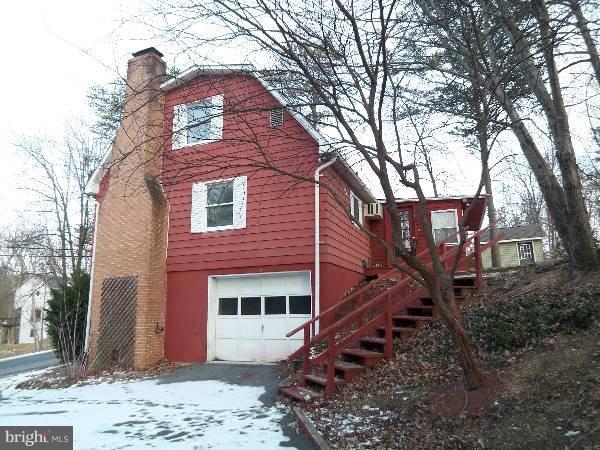 143 Holiday Road Cross Junction, VA 22625 - Photo 3 of 22 a view of a house with a yard